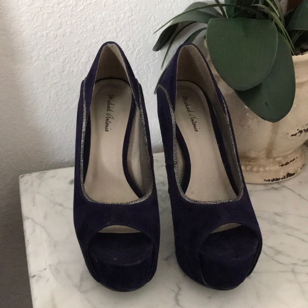 They are a pair of blue with silver heels.